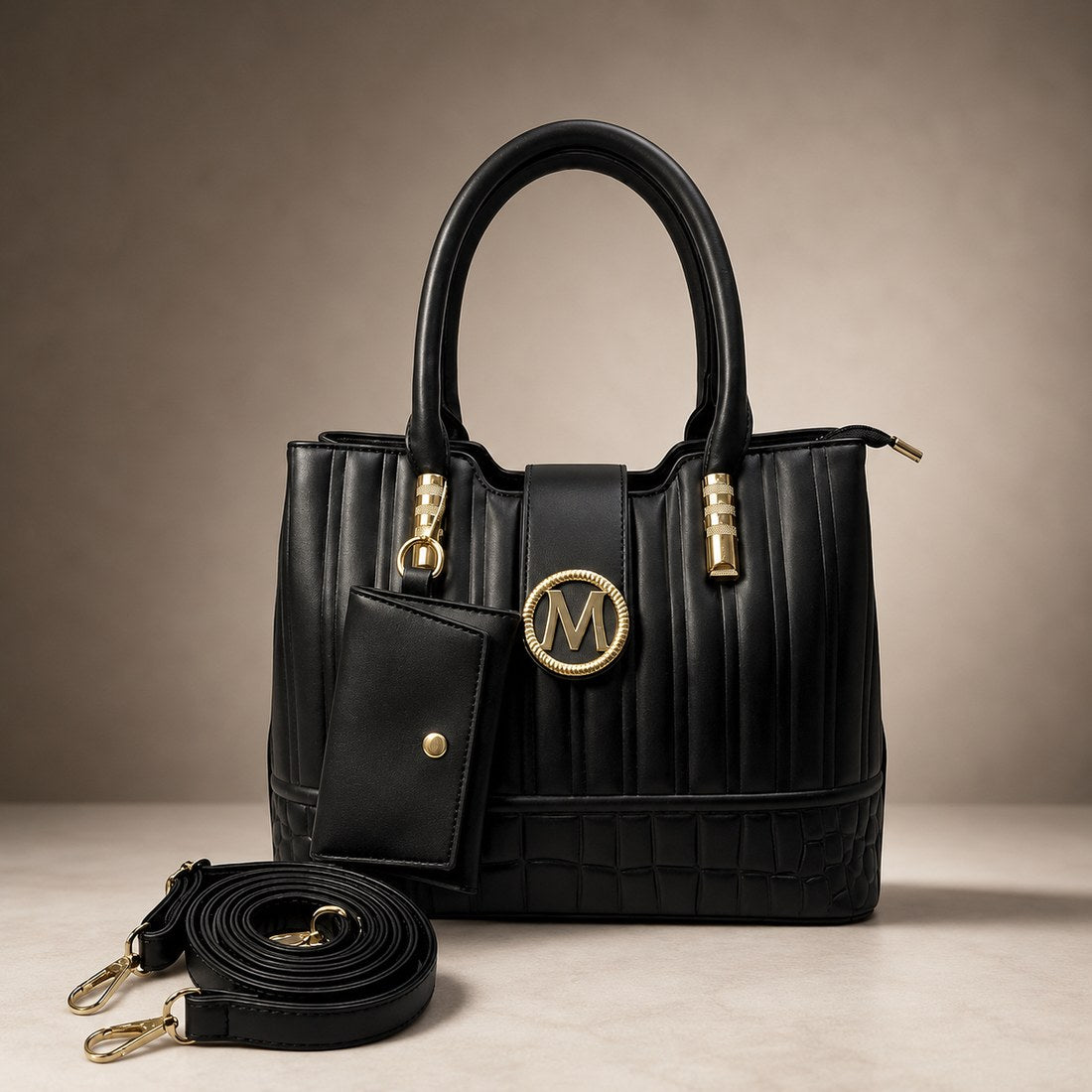 Black handbag with gold accents and a visible brand logo on a neutral background