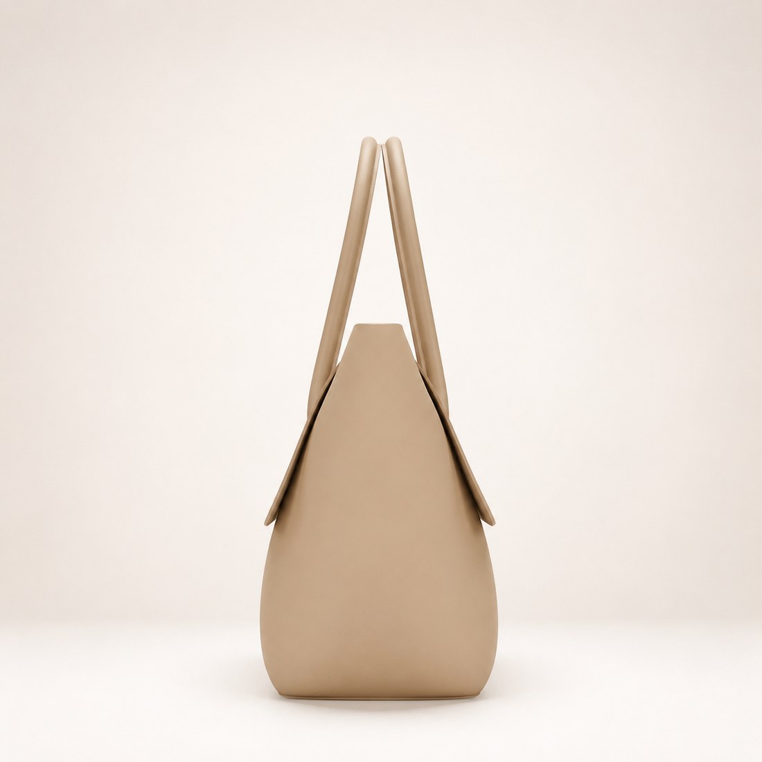 Beige handbag with a minimalist design on a light beige background