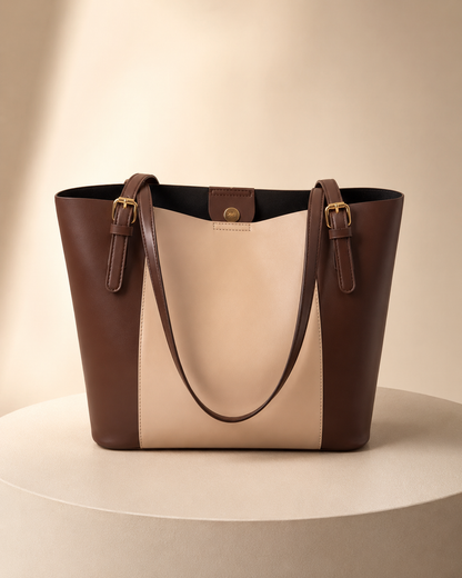 Two-toned brown and beige handbag on a beige background