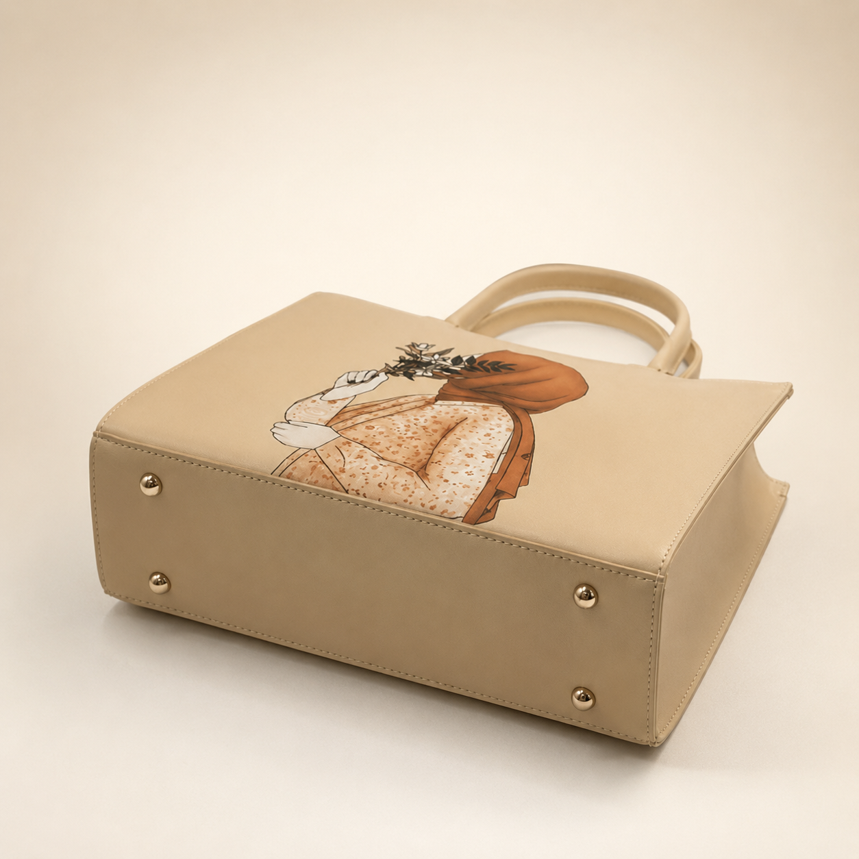 Beige handbag with a decorative design on a beige background