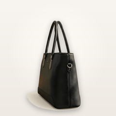 Black handbag on a white background